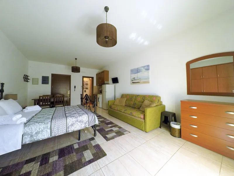 The studio's sofa and chest of drawers